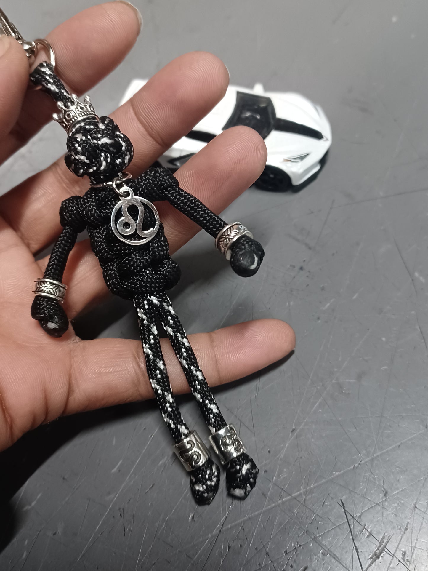 Black LEO Zodi Buddy Keychain